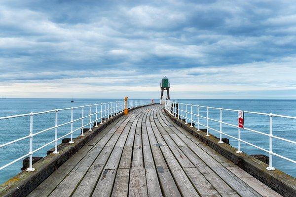 Which UK coastal town offers the most authentic experiences in maritime folklore?